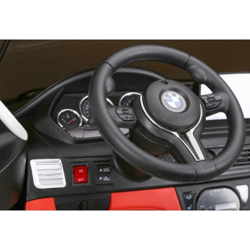 BMW X6M XXL pre 2 deti Biely + Ovládač + Ekokoža + Pásy + Pomalý štart + MP3 USB + LED