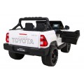 Toyota Hilux na batériu pre deti Biela + Pohon 4x4 + Ovládač + 2 batožinové priestory + Rádio MP3 + LED