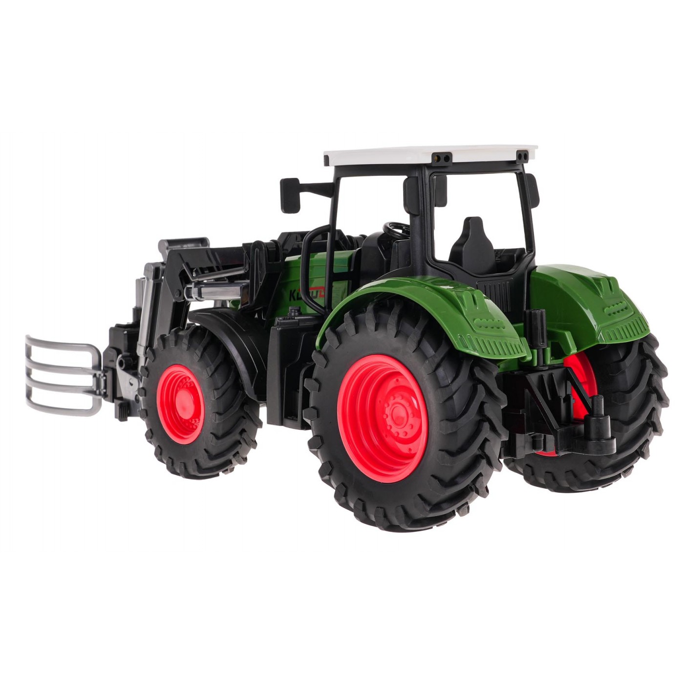 Zelený traktor s drapákom