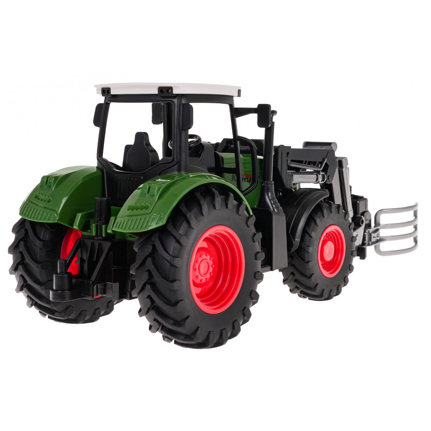 Zelený traktor s drapákom