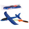 Polystyrénové lietadlo s modrým manuálnym odpaľovacím zariadením