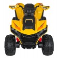 Štvorkolkové vozidlo s rýchlym kolesom žlté