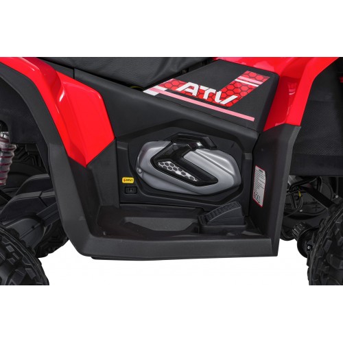 Červené štvorkolkové vozidlo