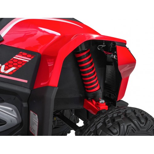 Červené štvorkolkové vozidlo