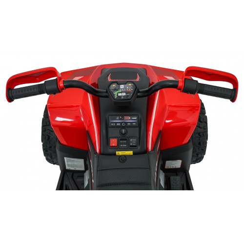 Červené štvorkolkové vozidlo