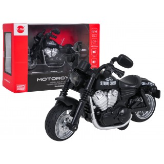 Kovový motocykel čiernej farby so svetlami a zvukovou funkciou