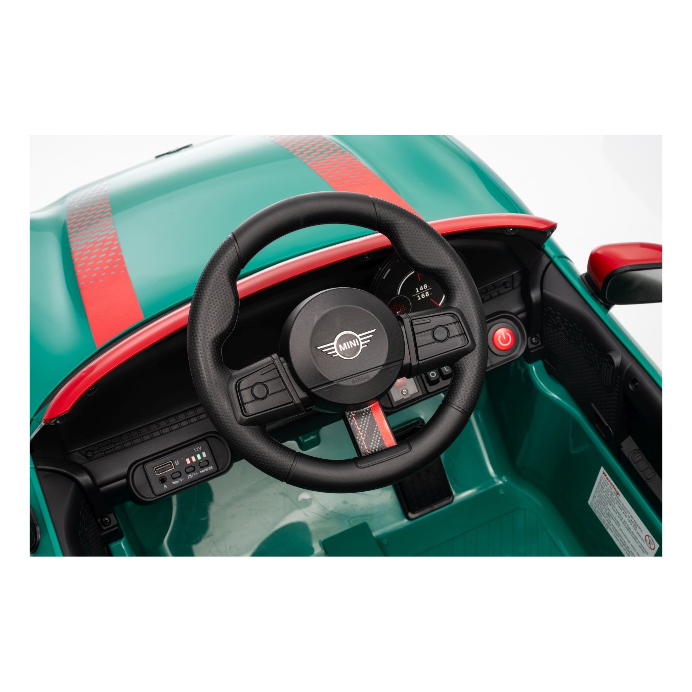 Zelené vozidlo Mini Cooper