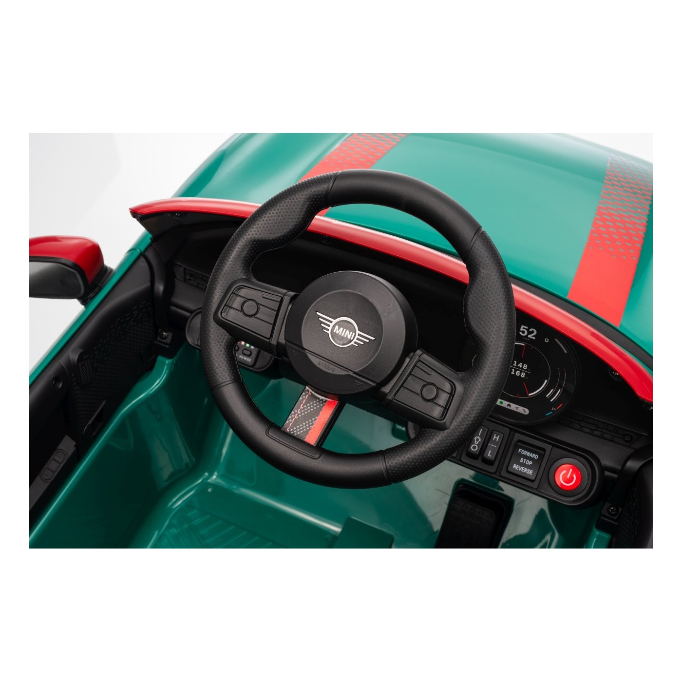 Zelené vozidlo Mini Cooper