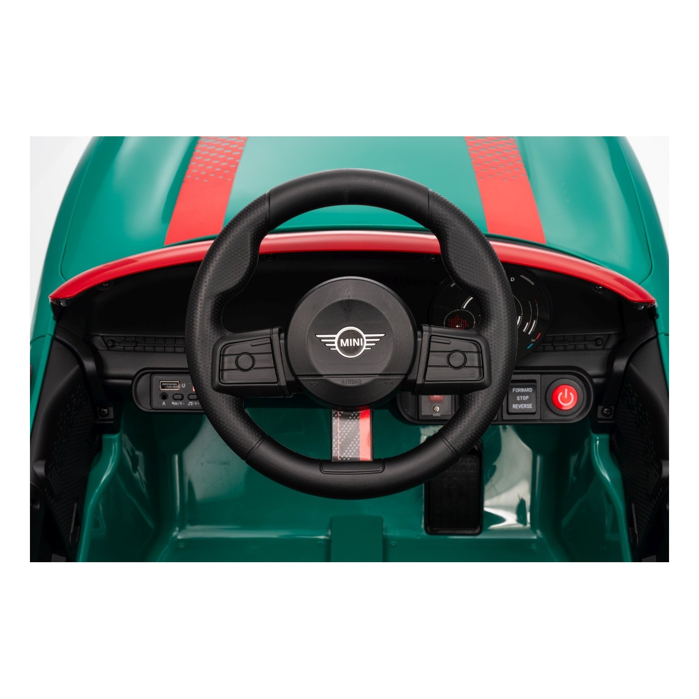 Zelené vozidlo Mini Cooper