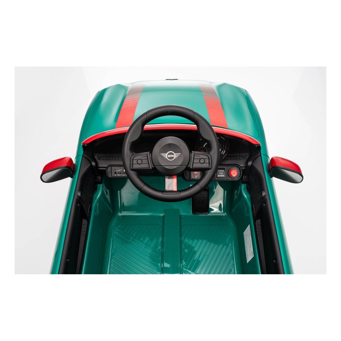 Zelené vozidlo Mini Cooper