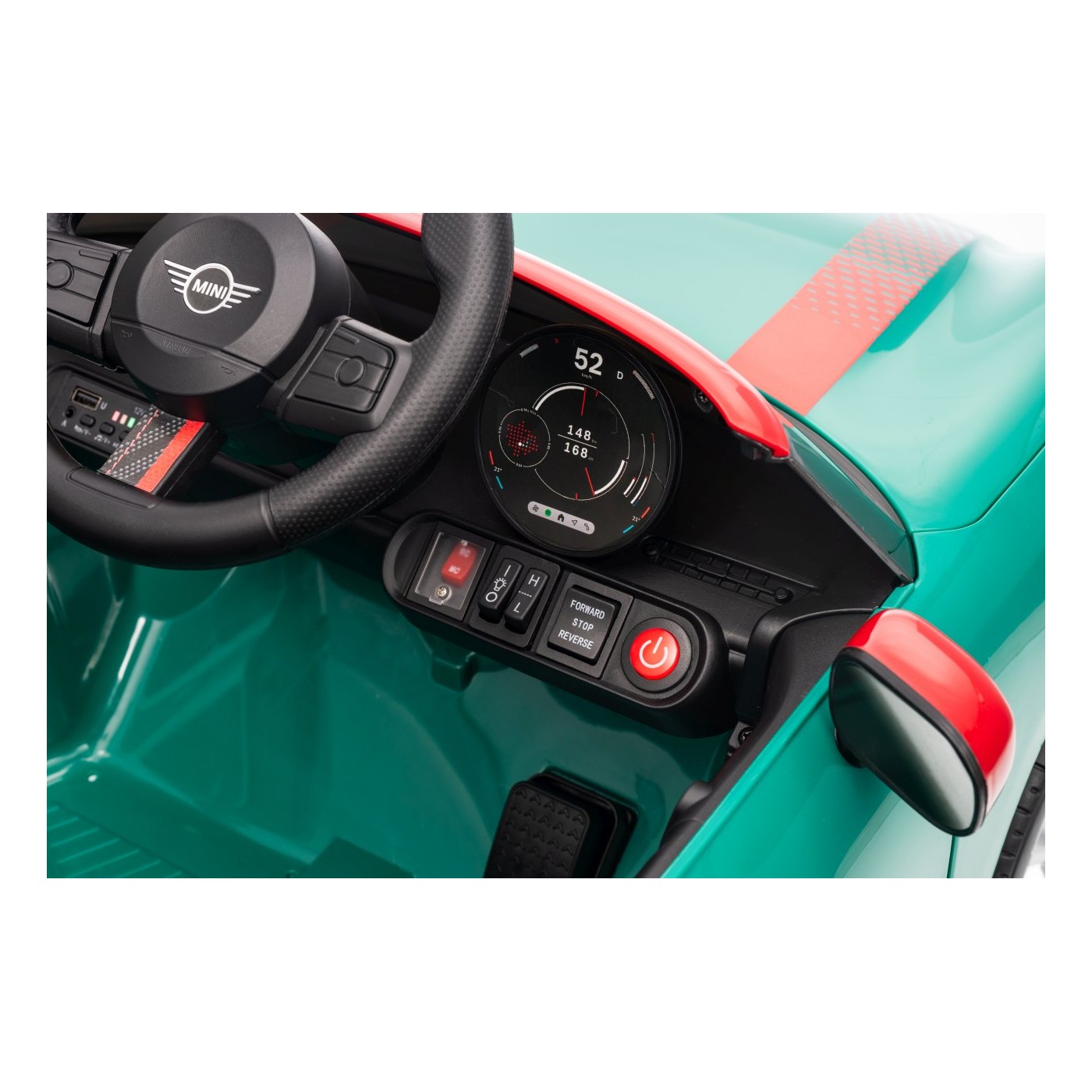 Zelené vozidlo Mini Cooper