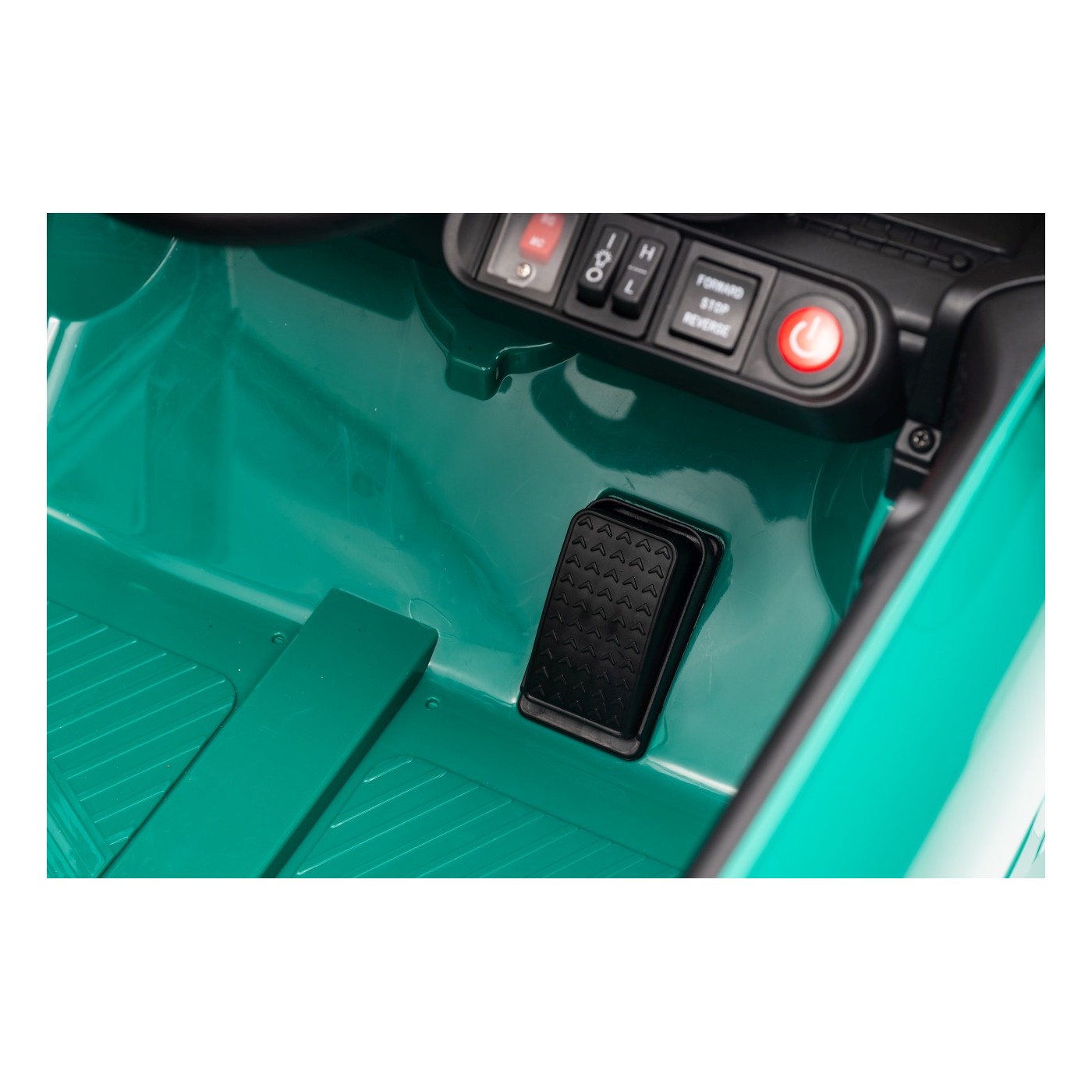 Zelené vozidlo Mini Cooper