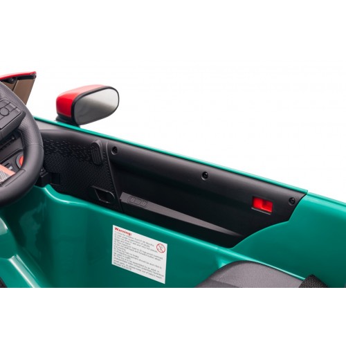 Zelené vozidlo Mini Cooper