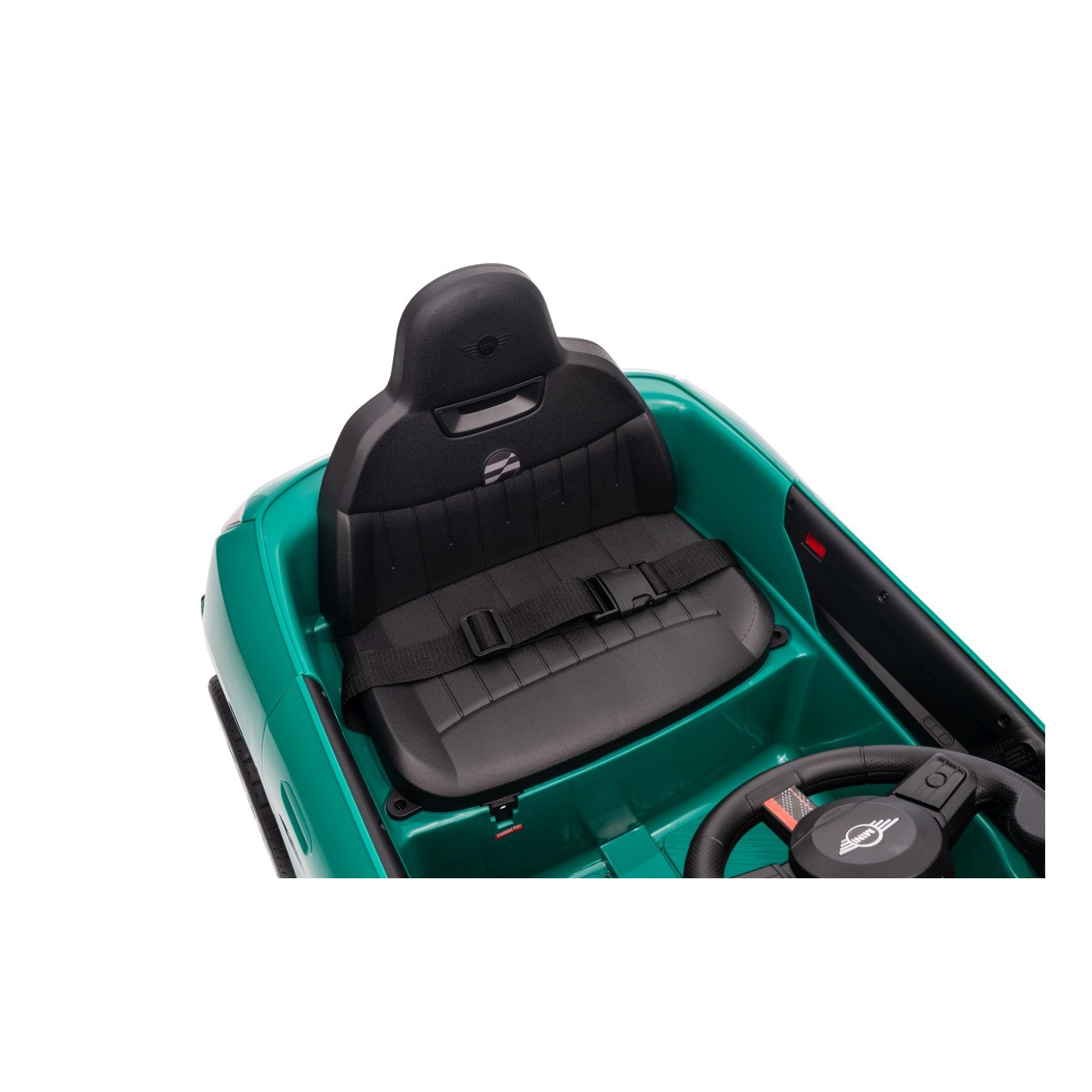 Zelené vozidlo Mini Cooper