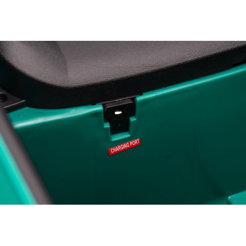 Zelené vozidlo Mini Cooper