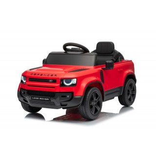 Červené vozidlo Land Rover Defender