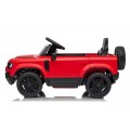 Červené vozidlo Land Rover Defender