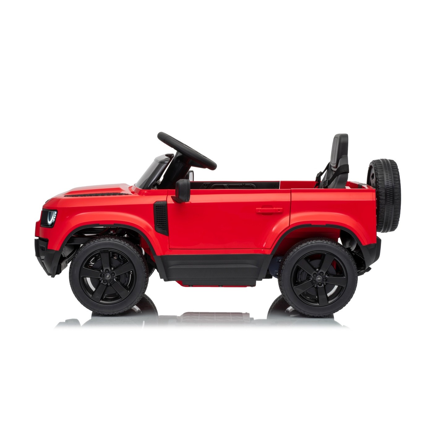 Červené vozidlo Land Rover Defender