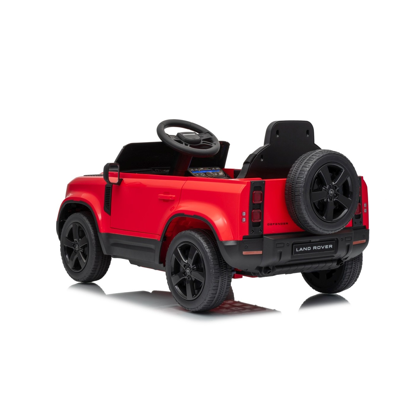 Červené vozidlo Land Rover Defender