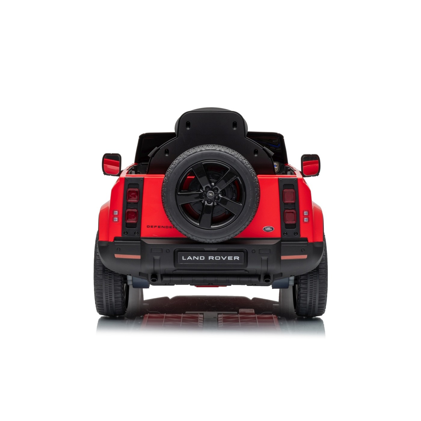 Červené vozidlo Land Rover Defender