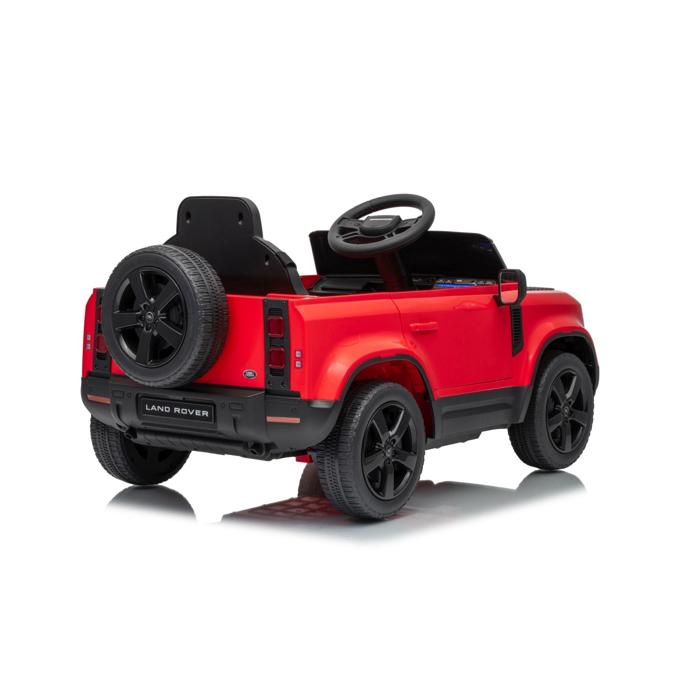 Červené vozidlo Land Rover Defender