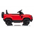 Červené vozidlo Land Rover Defender
