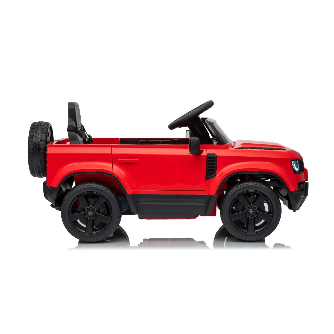 Červené vozidlo Land Rover Defender