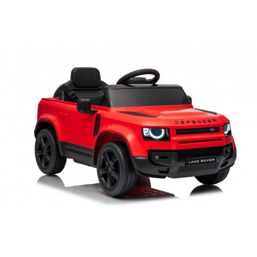 Červené vozidlo Land Rover Defender