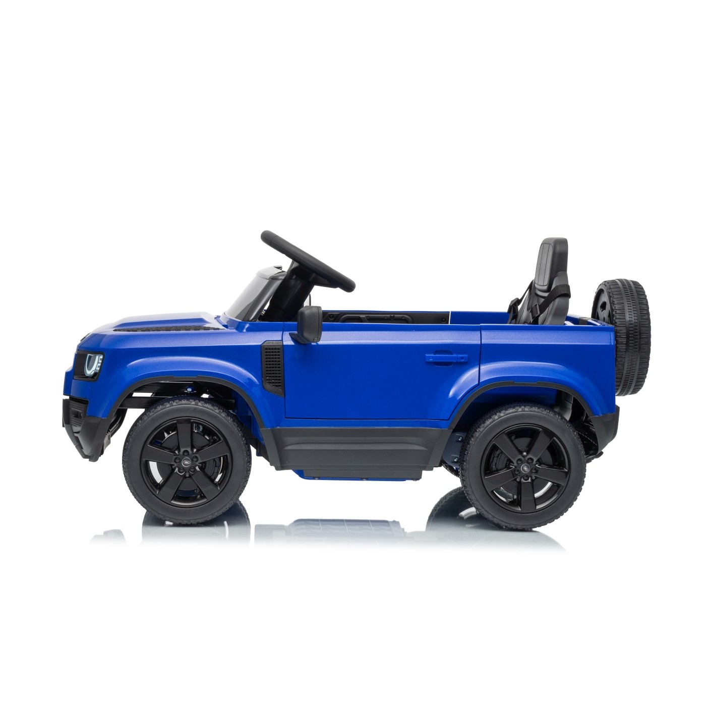 Modré vozidlo Land Rover Defender