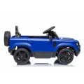 Modré vozidlo Land Rover Defender