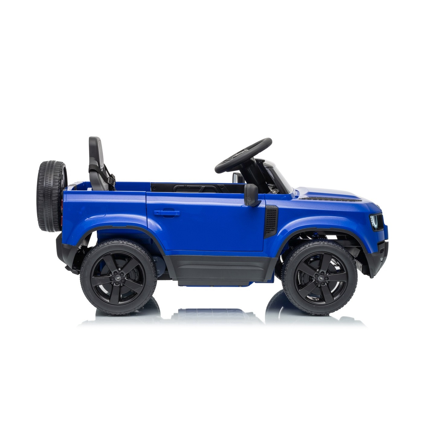 Modré vozidlo Land Rover Defender