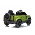 Zelené vozidlo Land Rover Defender