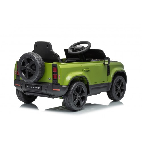 Zelené vozidlo Land Rover Defender