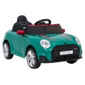 Zelené vozidlo Mini Cooper