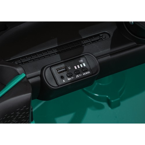 Zelené vozidlo Mini Cooper