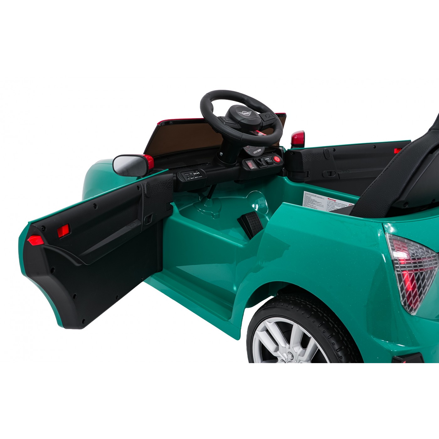 Zelené vozidlo Mini Cooper