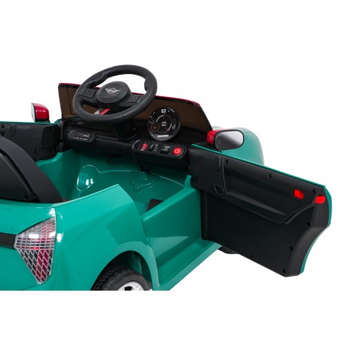 Zelené vozidlo Mini Cooper