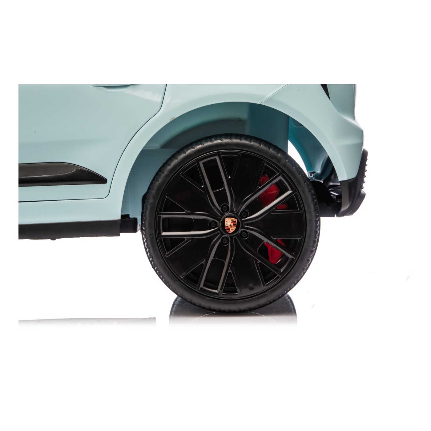 Modré vozidlo Porsche Macan