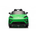 Zelené vozidlo Porsche Macan
