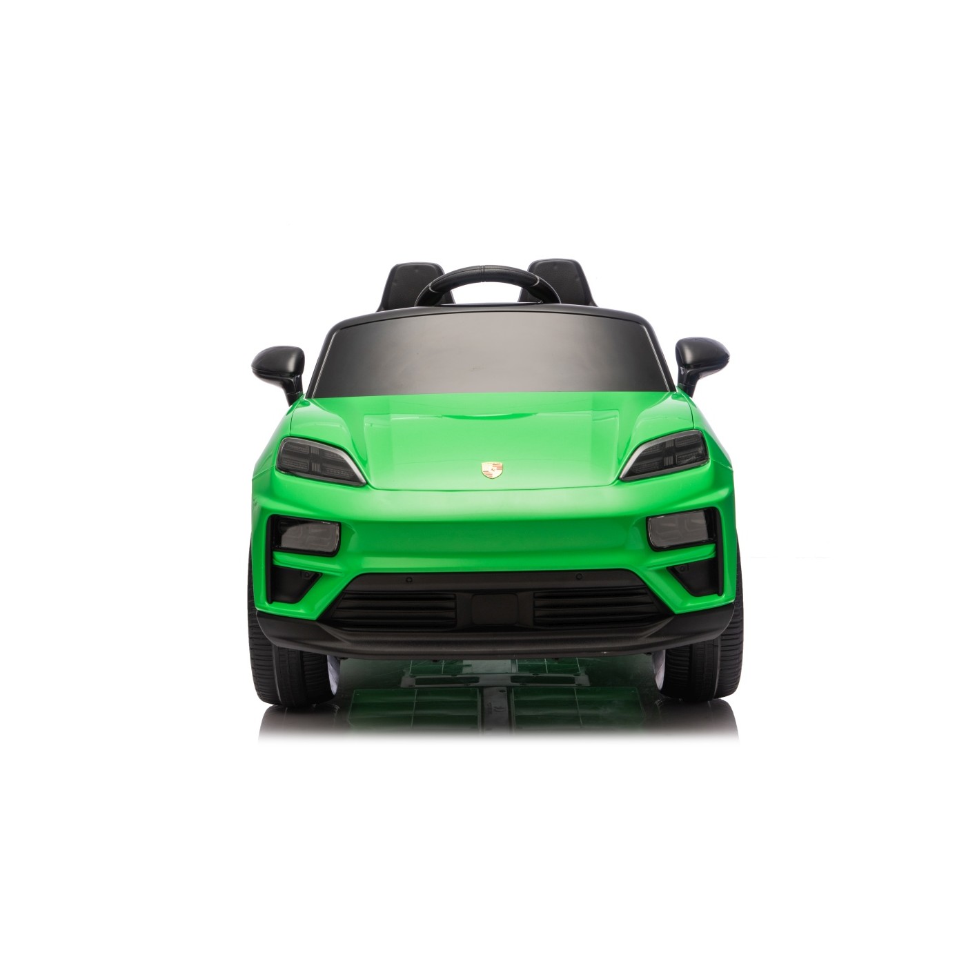 Zelené vozidlo Porsche Macan
