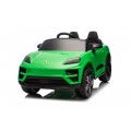 Zelené vozidlo Porsche Macan