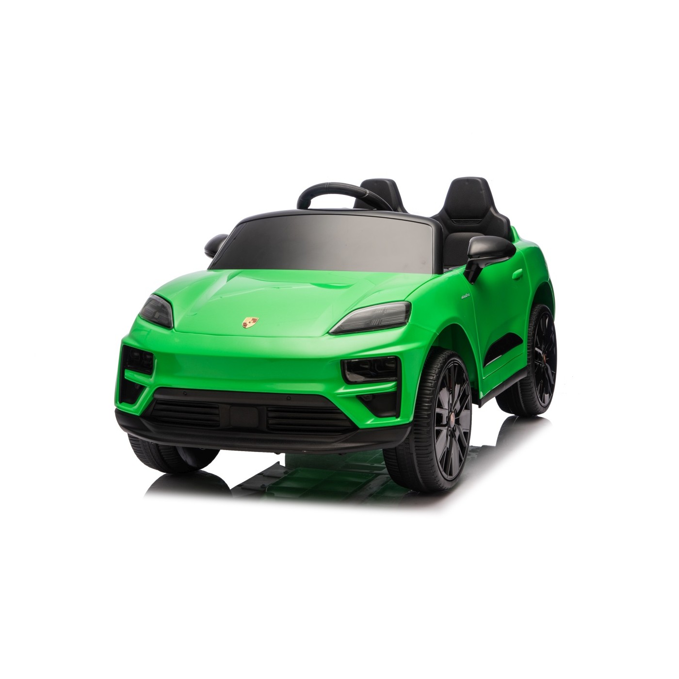 Zelené vozidlo Porsche Macan