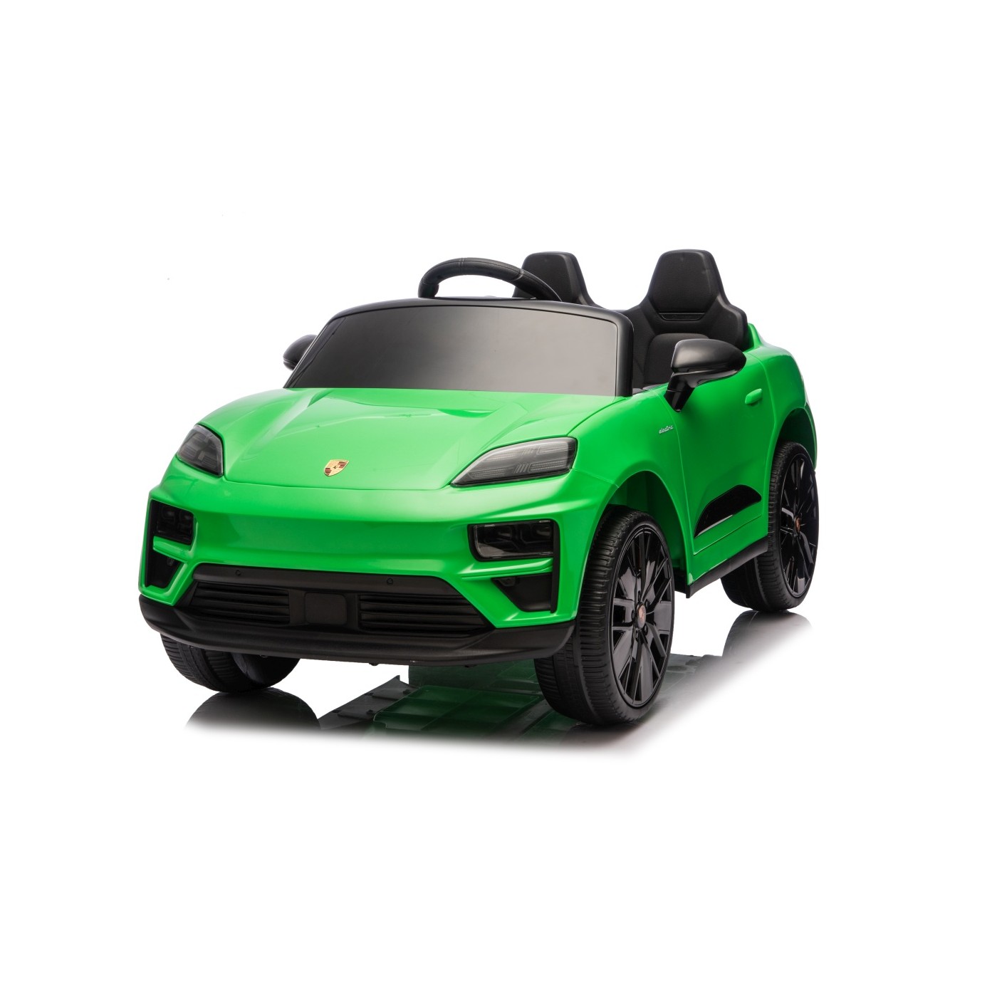 Zelené vozidlo Porsche Macan