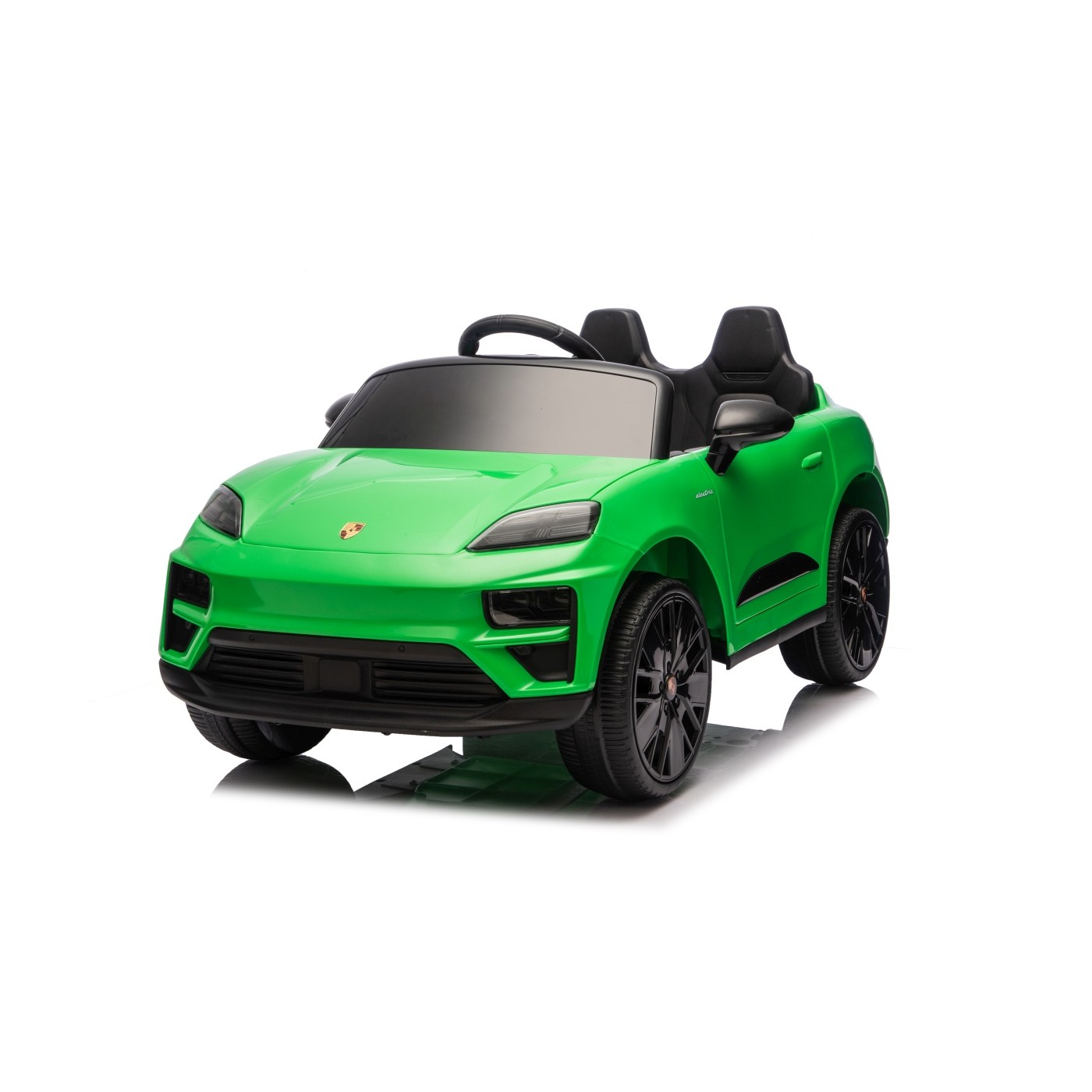 Zelené vozidlo Porsche Macan