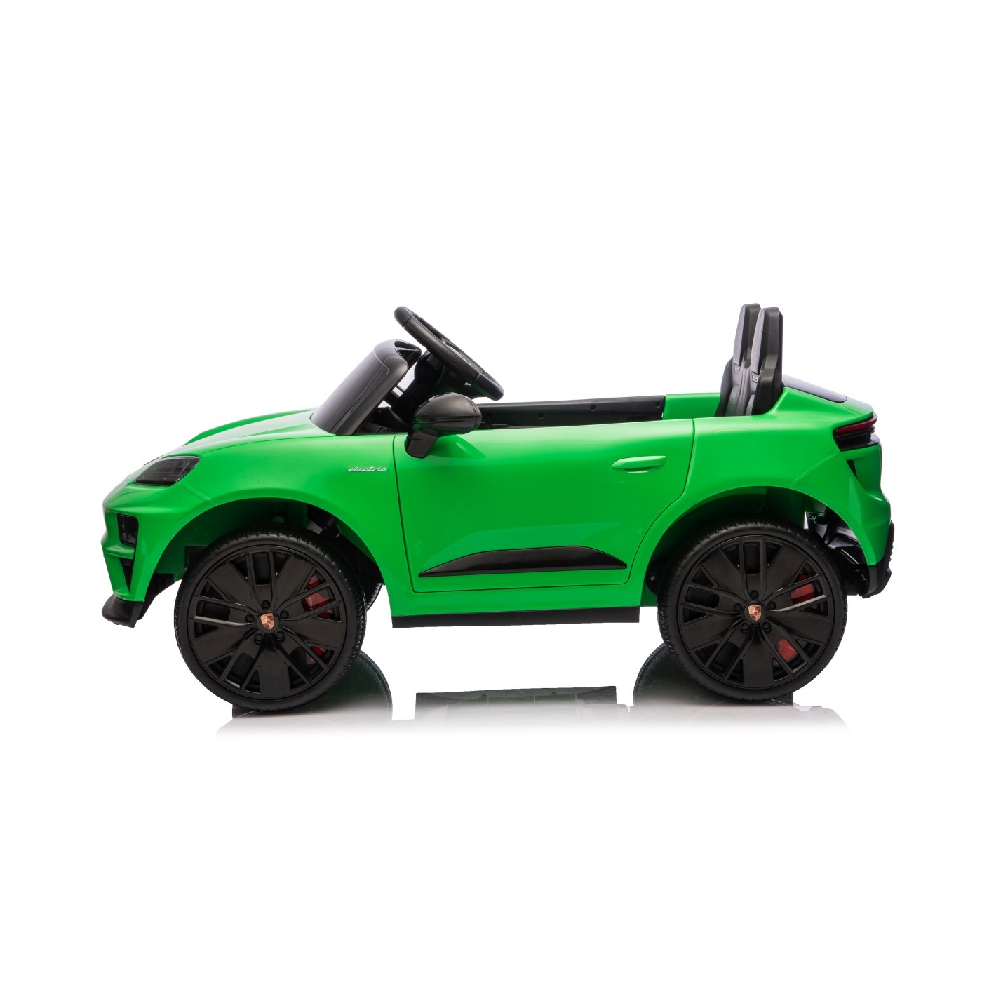 Zelené vozidlo Porsche Macan