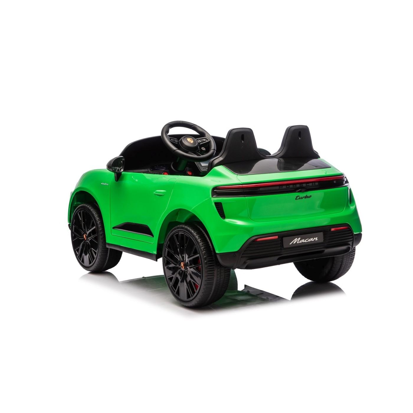 Zelené vozidlo Porsche Macan