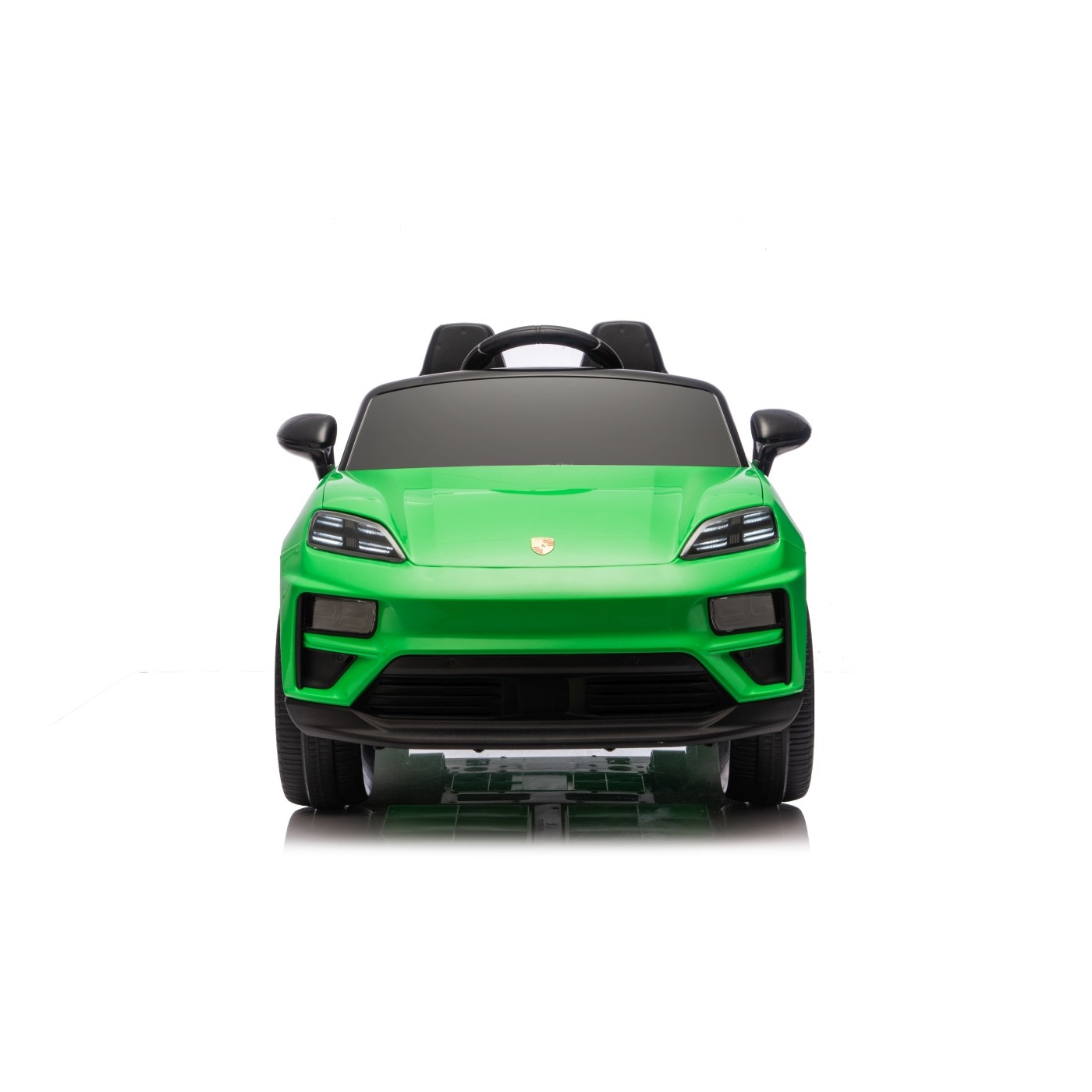 Zelené vozidlo Porsche Macan