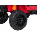 Červené vozidlo Jeep Monster