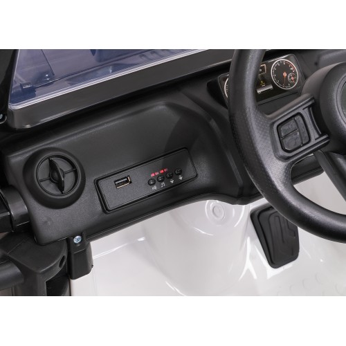 Biele vozidlo Jeep Monster