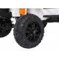 Biele vozidlo Jeep Monster